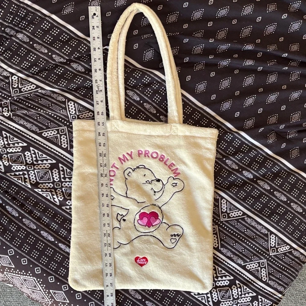 Divided Care Bears Cream Tote Bag